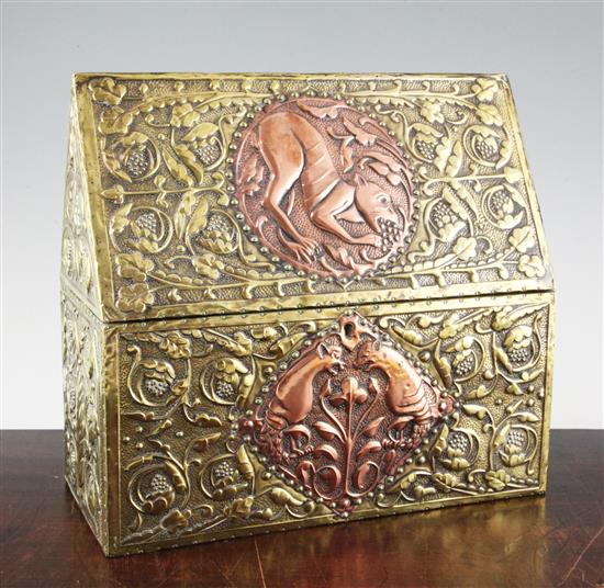 An Arts and Crafts embossed brass and copper casket, circa 1900, length 30cm, height 28cm